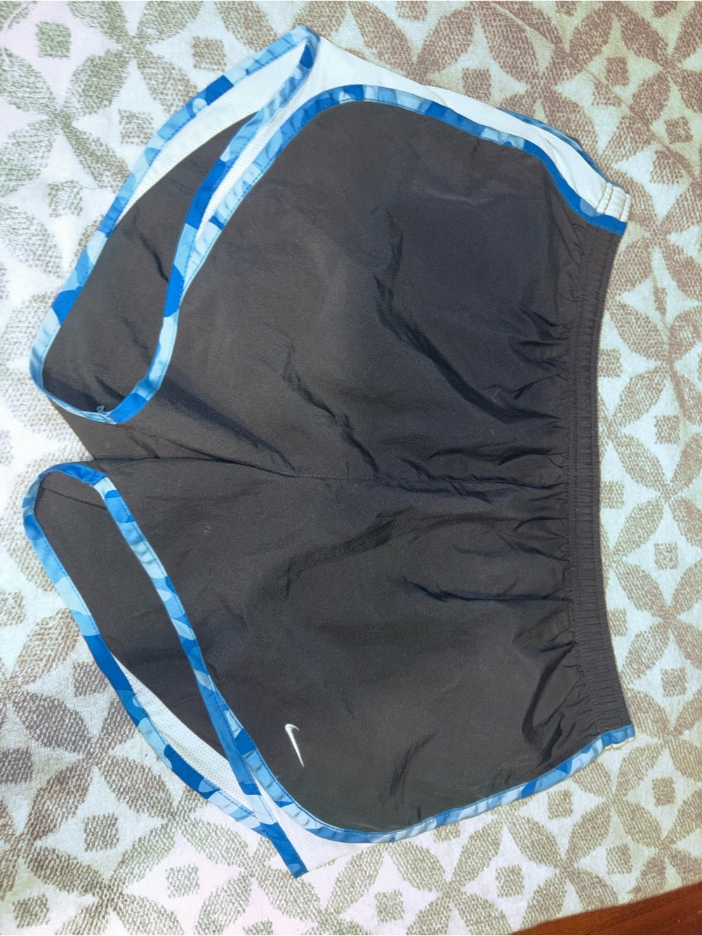 Nike Black Running Shorts with Blue Trim and White Swoosh